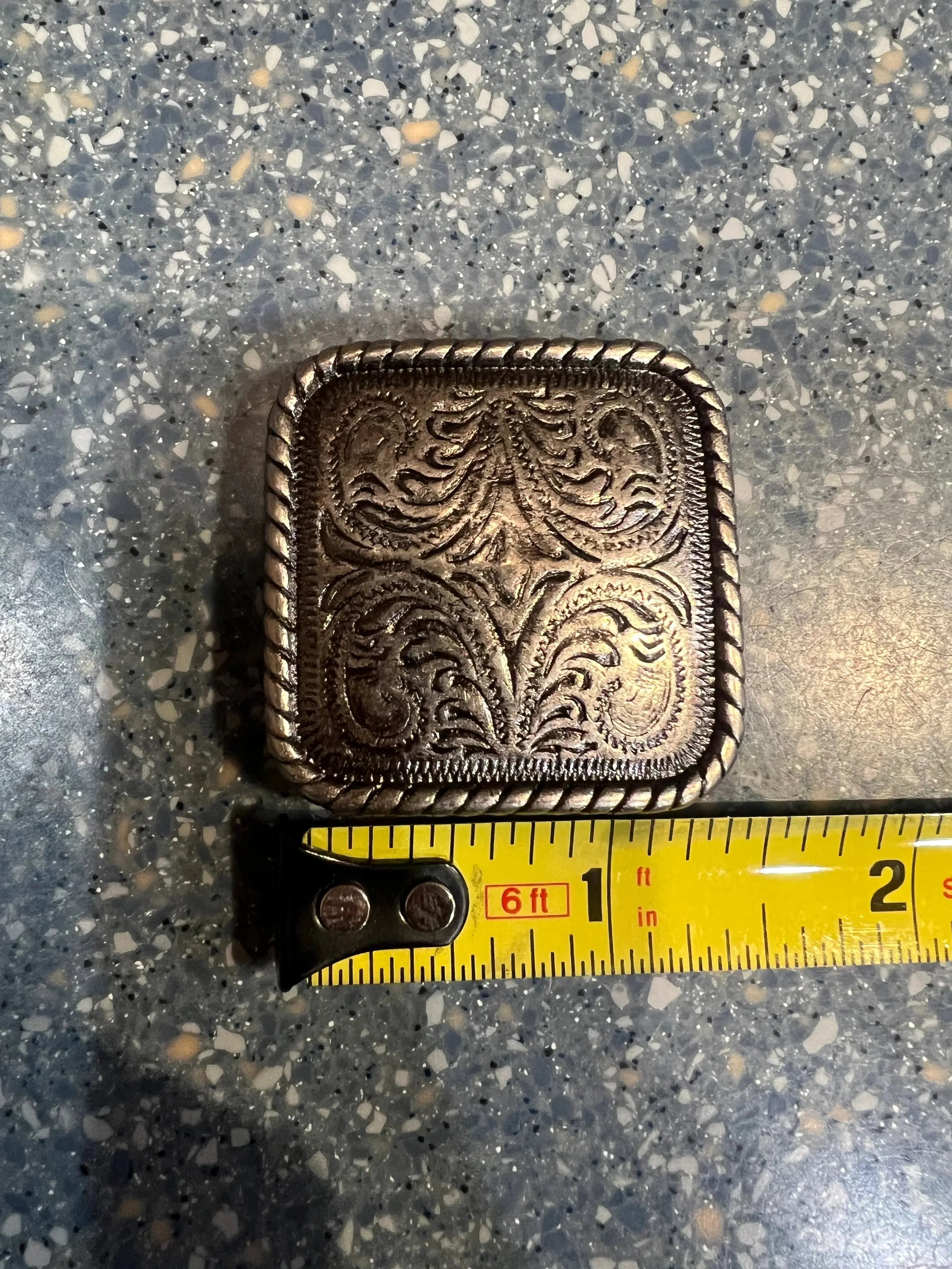 Silver engraved square concho with screw
