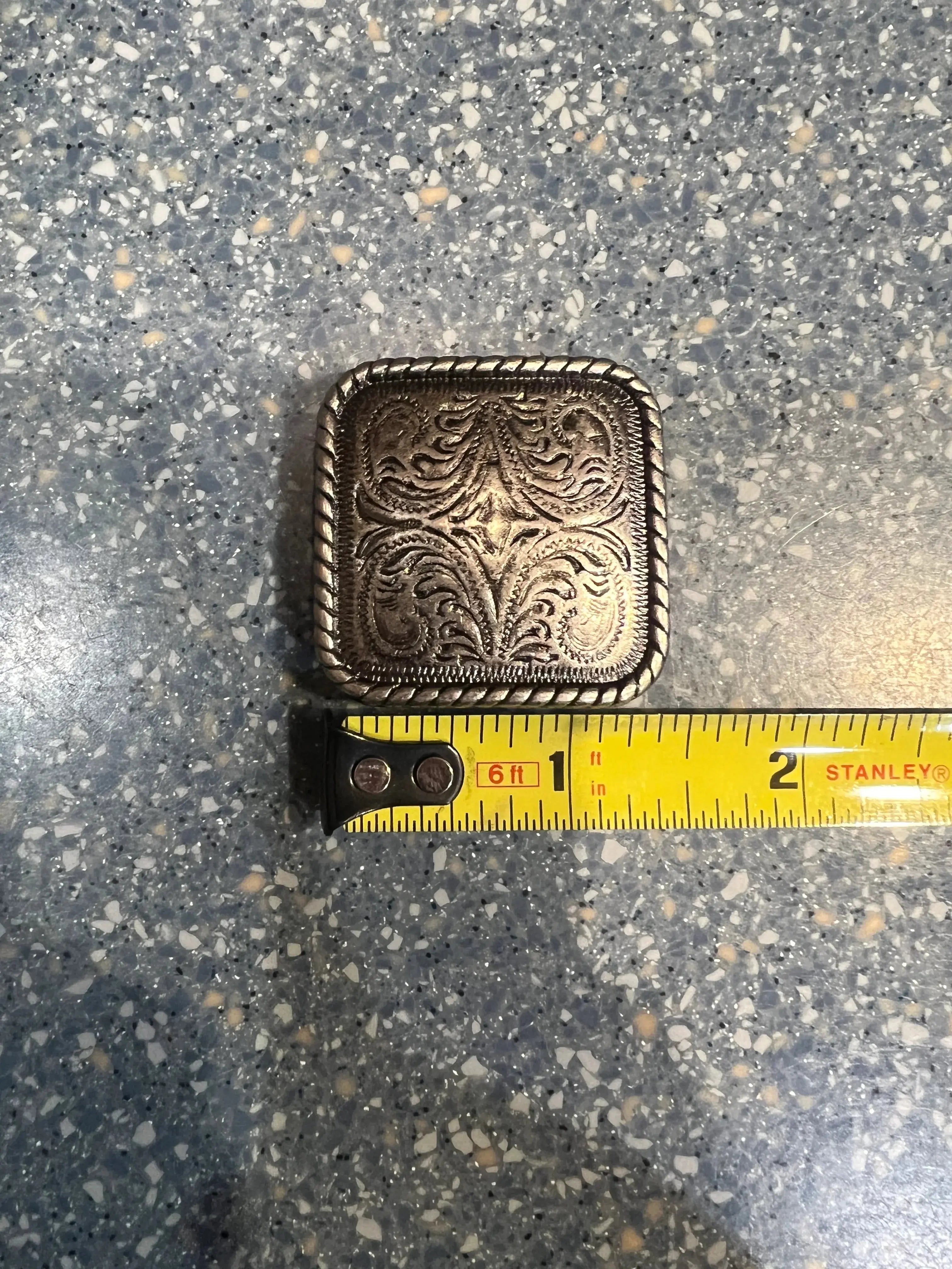 Silver engraved square concho with screw