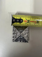 Silver pyramid shape concho with Screw.