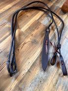 Oiled harness leather romal reins with popper, black with white stitching