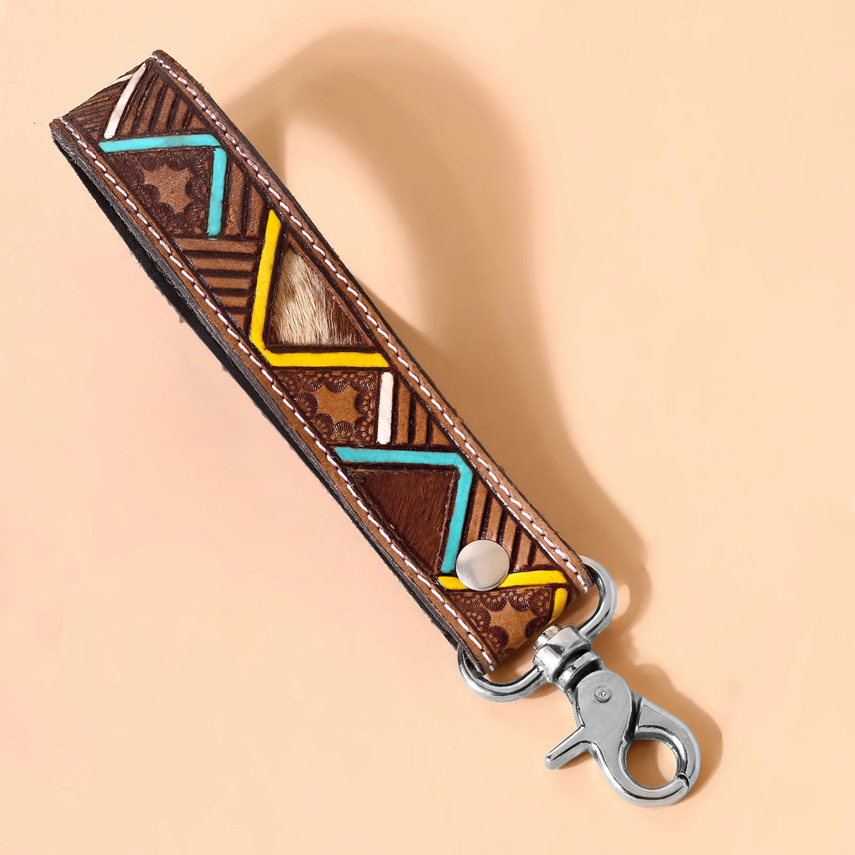 Soaring Bloom Handtooled Leather Keyfob In Saddle Tan