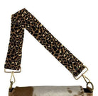 Leopard-print cowhide strap with metal hardware on Cheetah bag