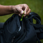tick remover in backpack
