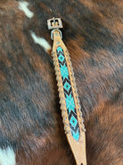 Genuine leather dog collar with teal, white, and black southwest beaded inlay design, a leather wrapped edge Dog