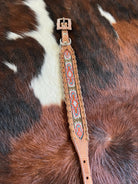 Genuine Leather dog collar with pink, white, and gold southwest beaded inlay design, a leather wrapped edge Dog