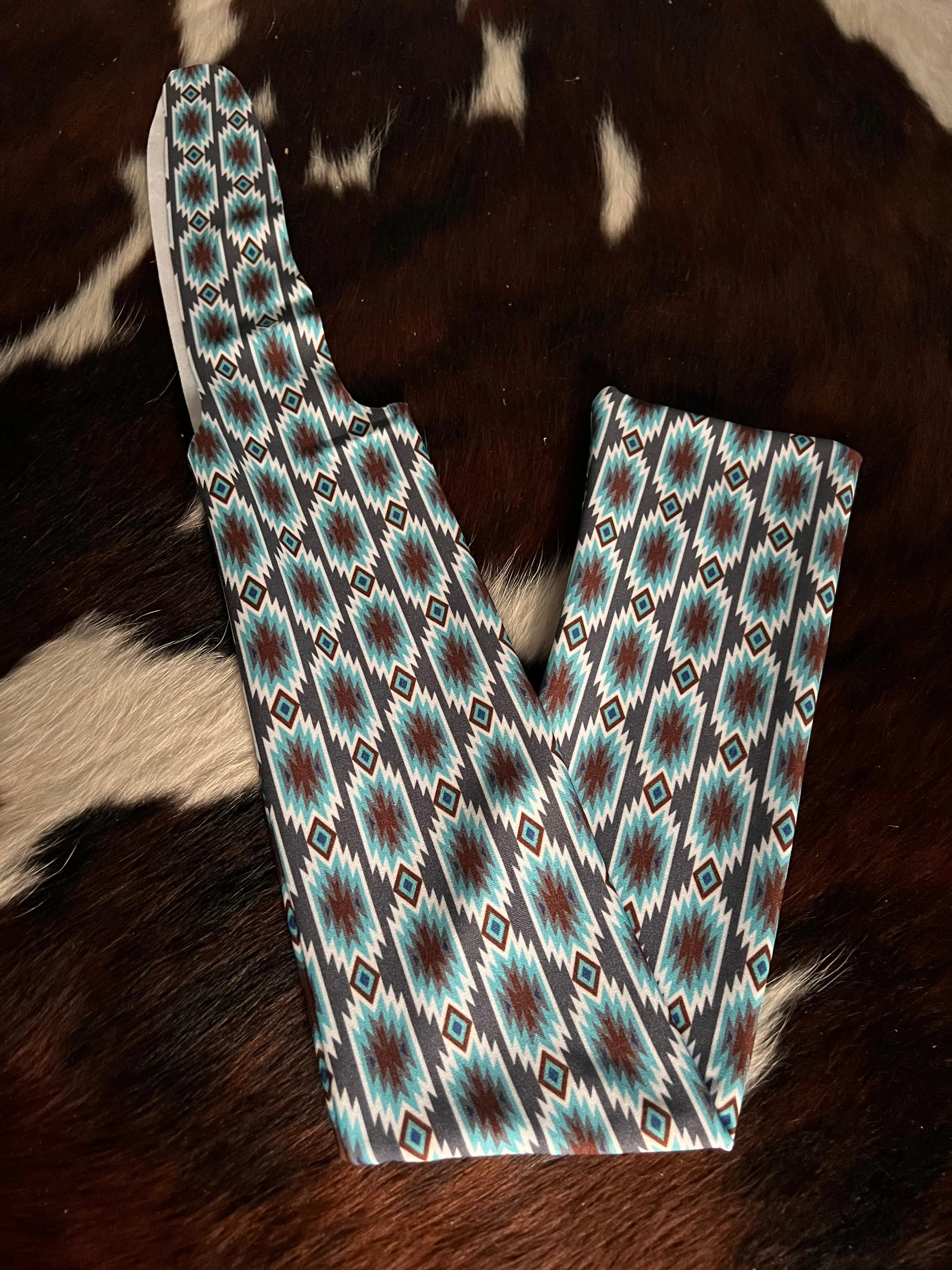 Blue Aztec Lycra printed slip on tail bag