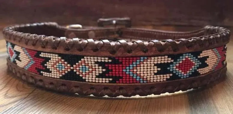 Genuine leather dog collar with red, white, and black southwest beaded inlay design, a leather wrapped edge Dog