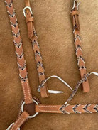 Tan leather braided horse halter with cheetah print accents
