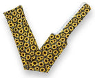 Yellow sunflower lycra tail bag sleeve with black centers and white lining