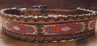 Genuine Leather dog collar with pink, white, and gold southwest beaded inlay design, a leather wrapped edge Dog