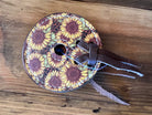 Sunflower Leopard Bit Guards: circular leather spool with sunflower pattern