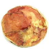 Golden-brown cracked Tremenda Disc Chews sourdough loaf