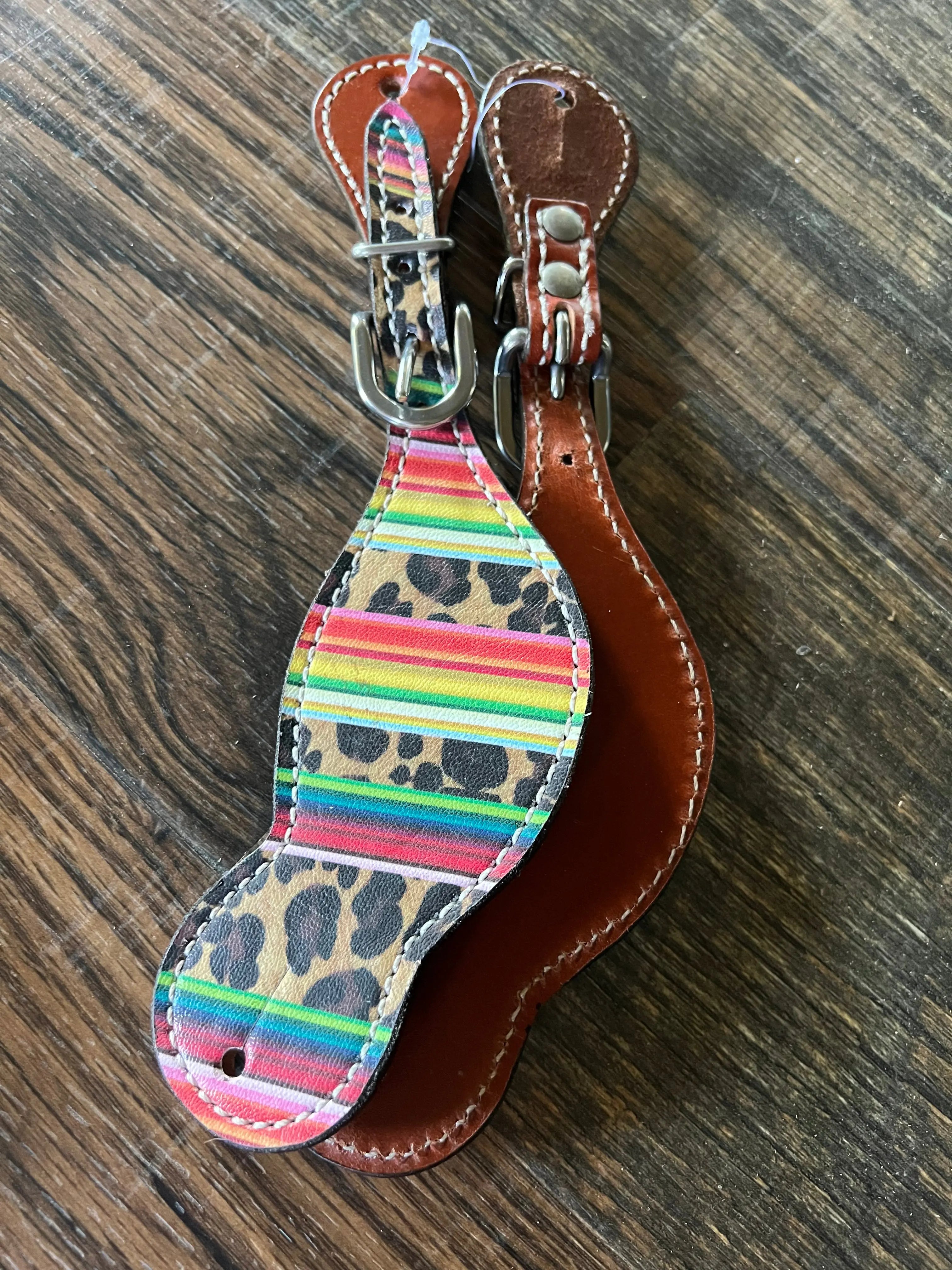 Ladies Serape Cheetah leather spur straps with rainbow stripes and leopard print