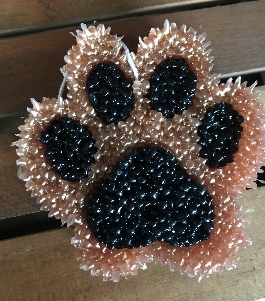 a close up of a chocolate covered donut 